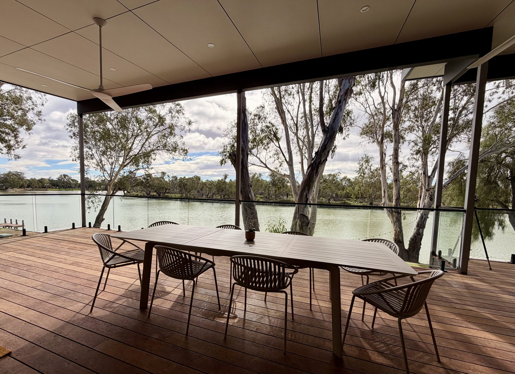 Front deck with outdoor dining and river view