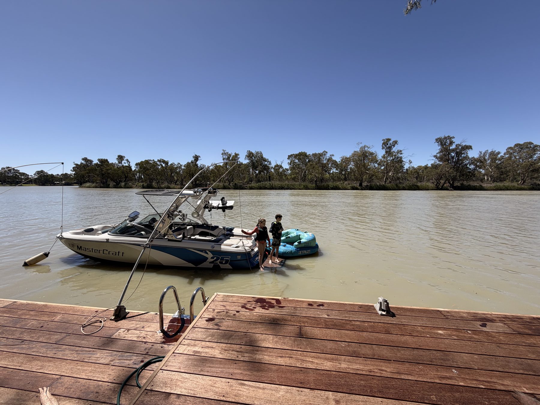 Boat moored at the private jetty on the Murray River
